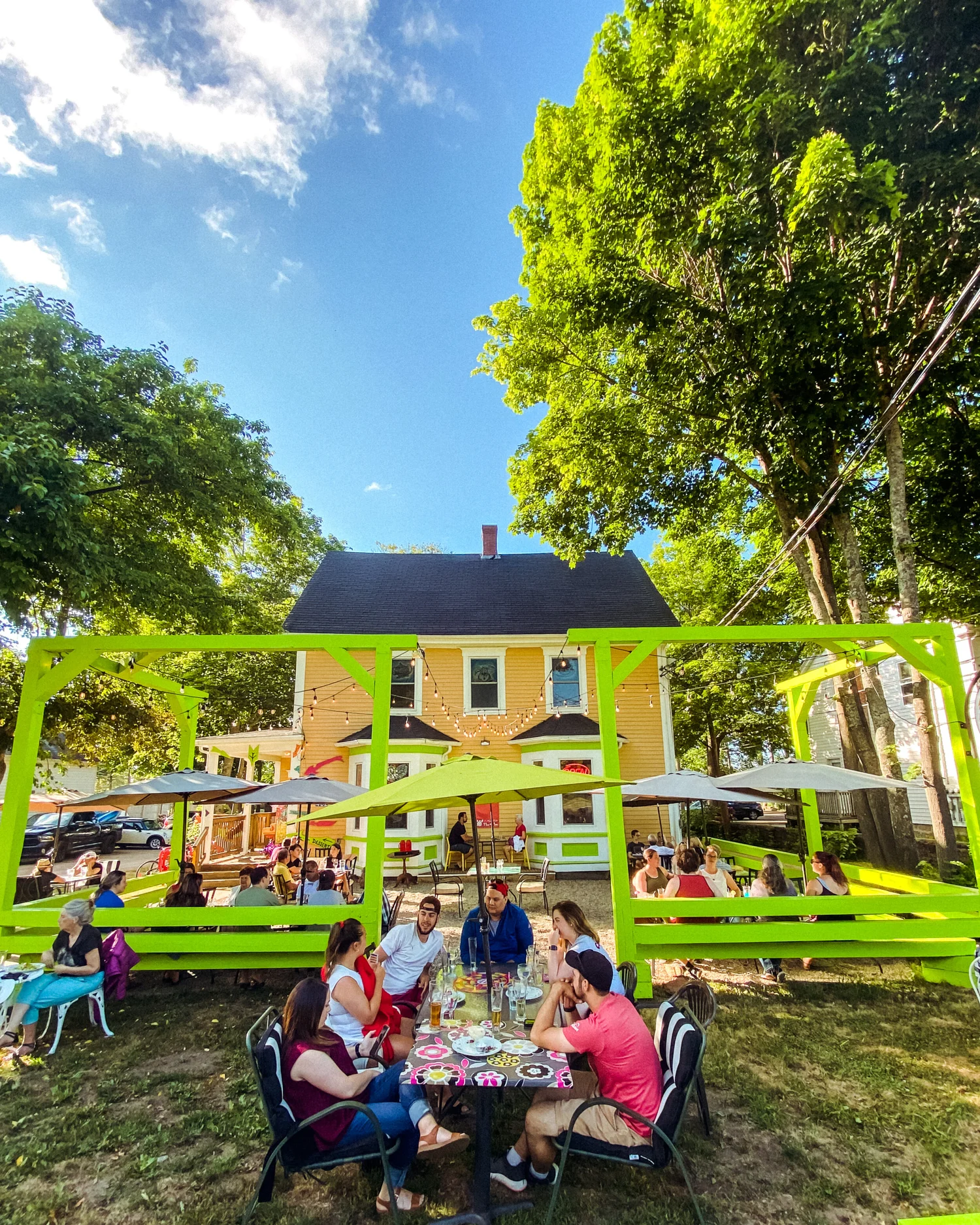 The green pergola patio on a bright summer day