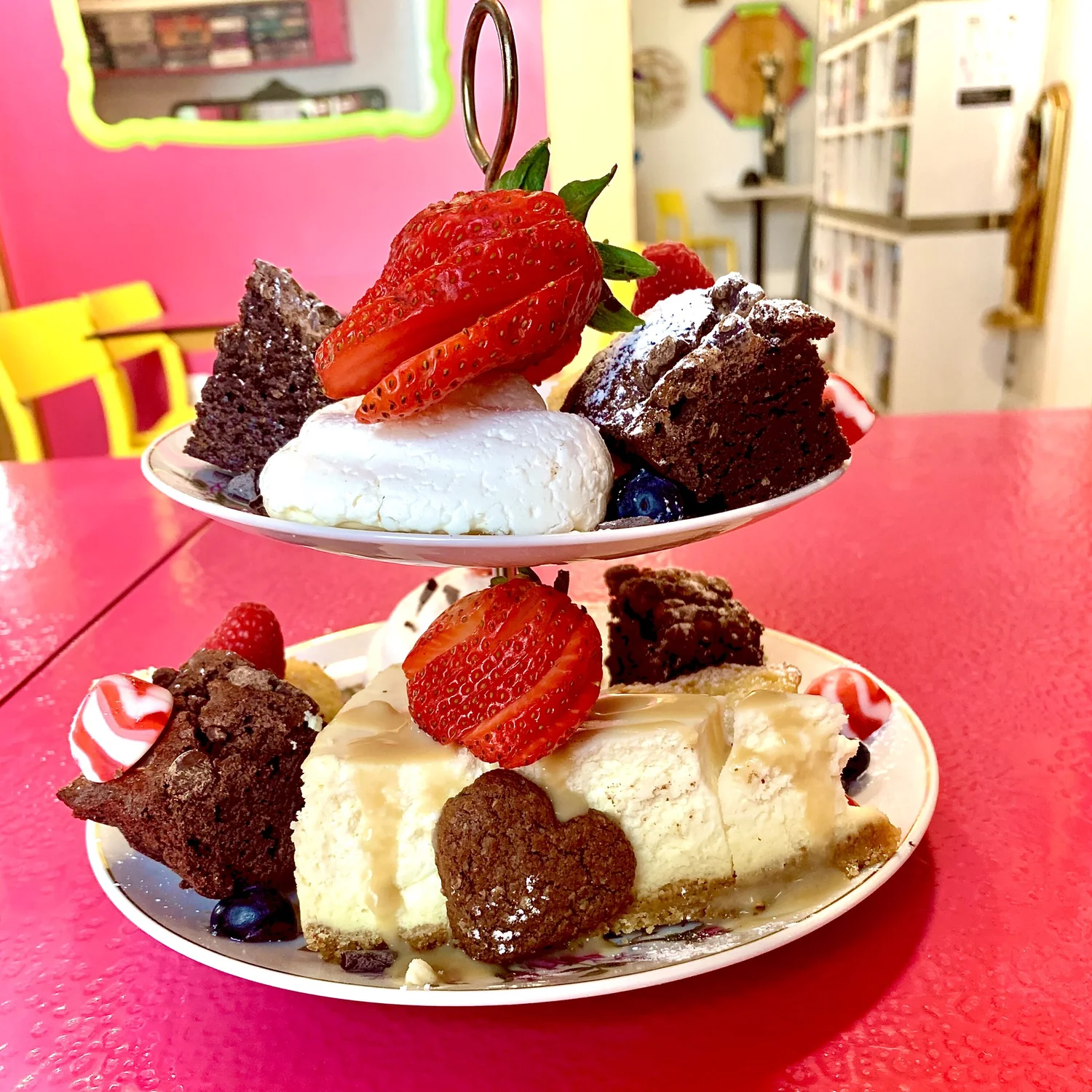 Two-tier dessert plate with brownies and cheesecake