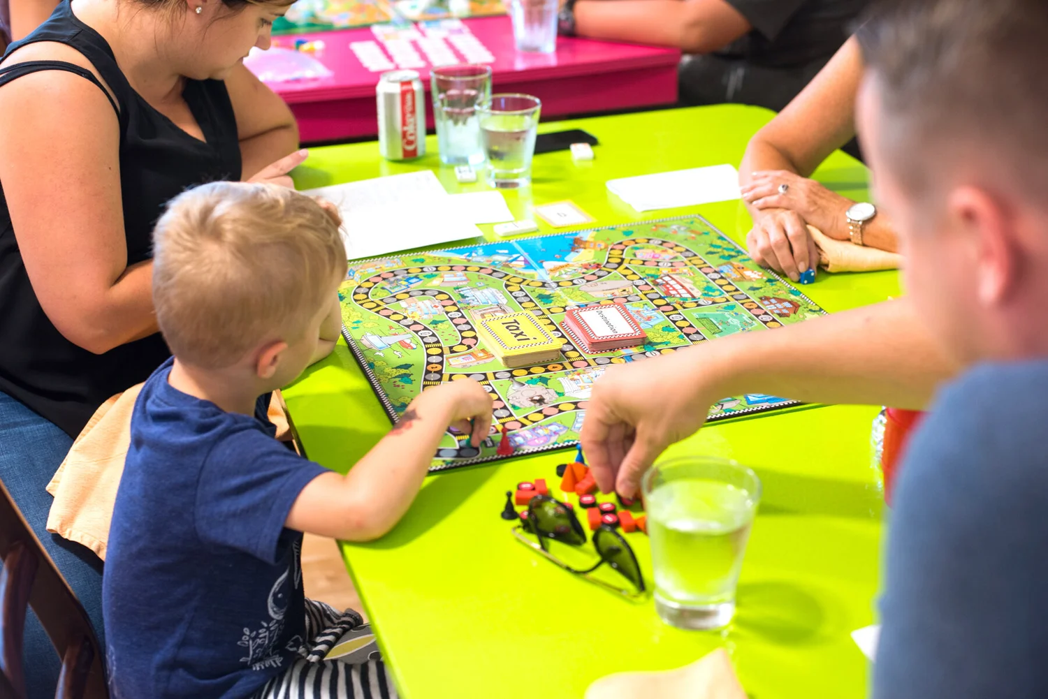 A child playing a colourful board game